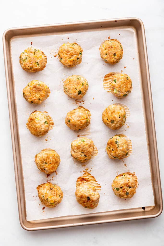 Overhead view of Asian turkey meatballs on baking sheet