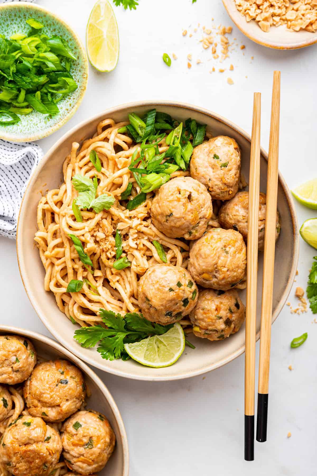 Overhead view of Asian turkey meatballs and peanut noodles in bowl