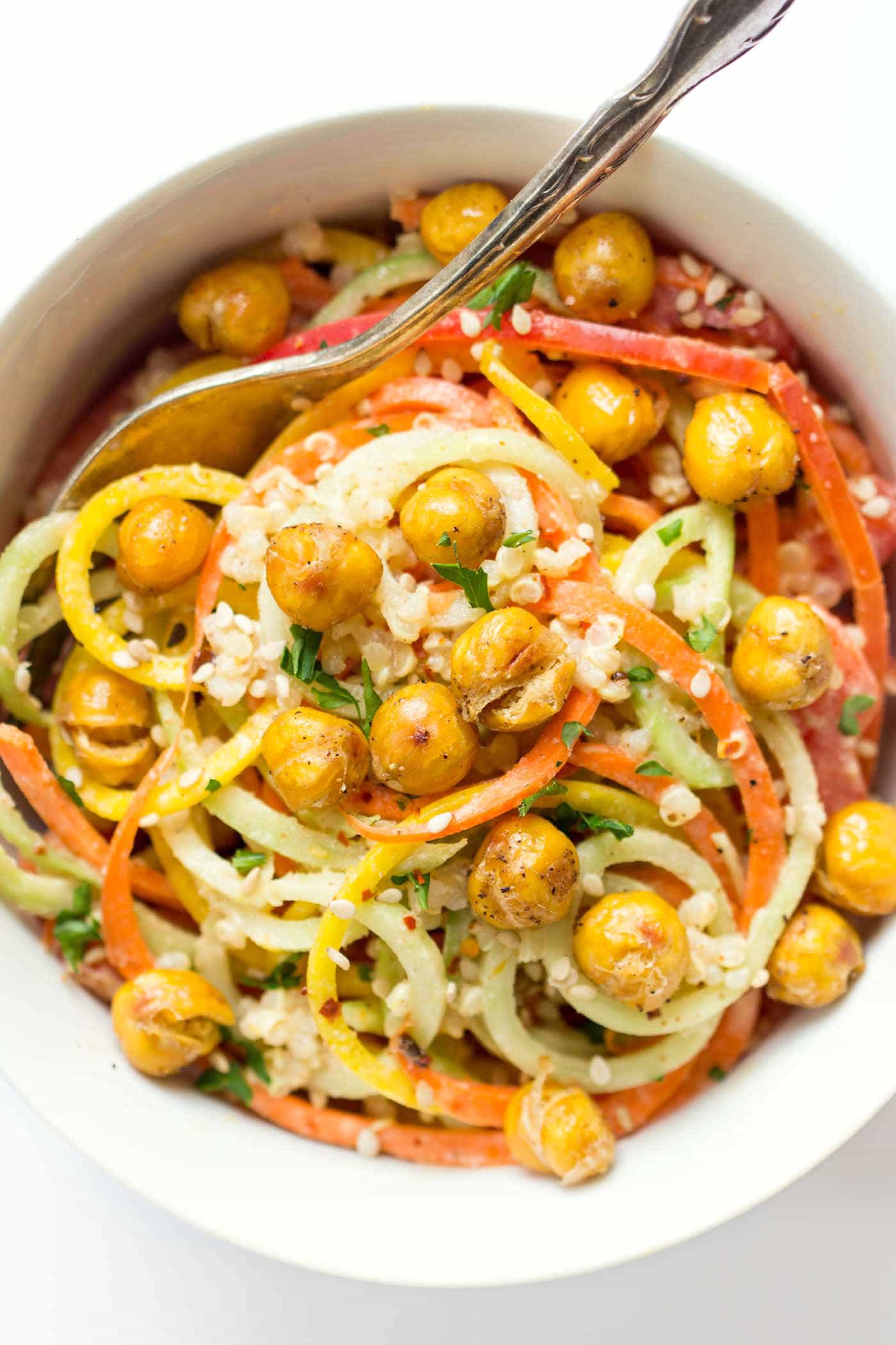 Rainbow Quinoa Power Salad with spiralized veggies, crispy chickpeas and an almond butter-lime dressing