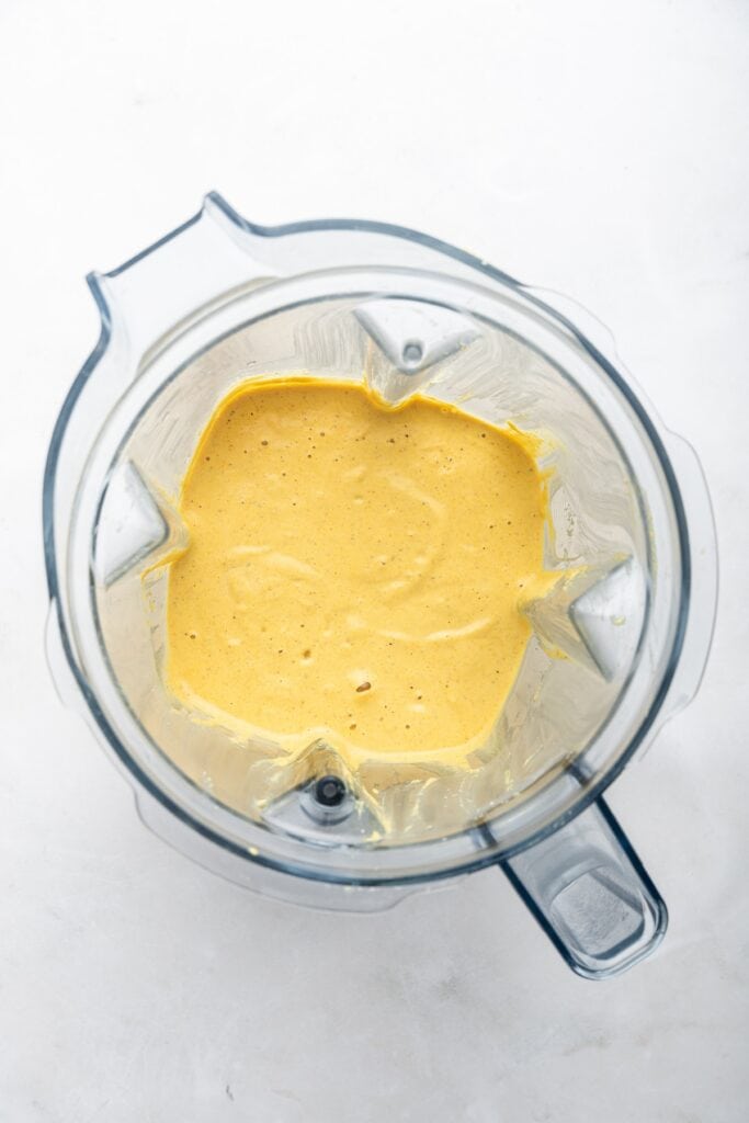 Overhead view of cashew cheese sauce in blender