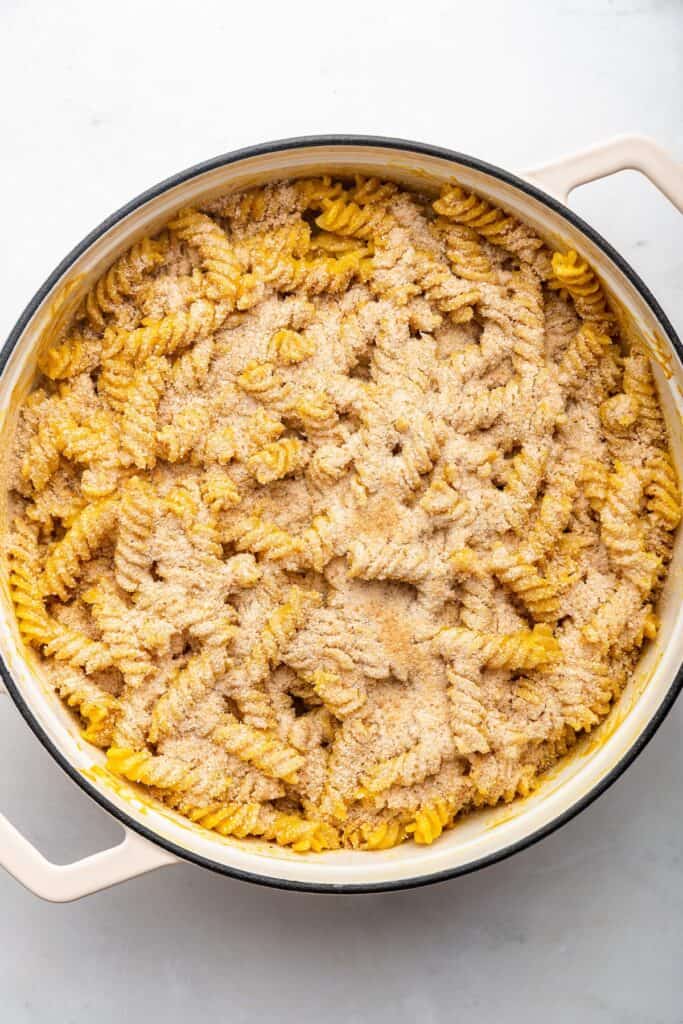 Overhead view of baked vegan mac and cheese in casserole dish