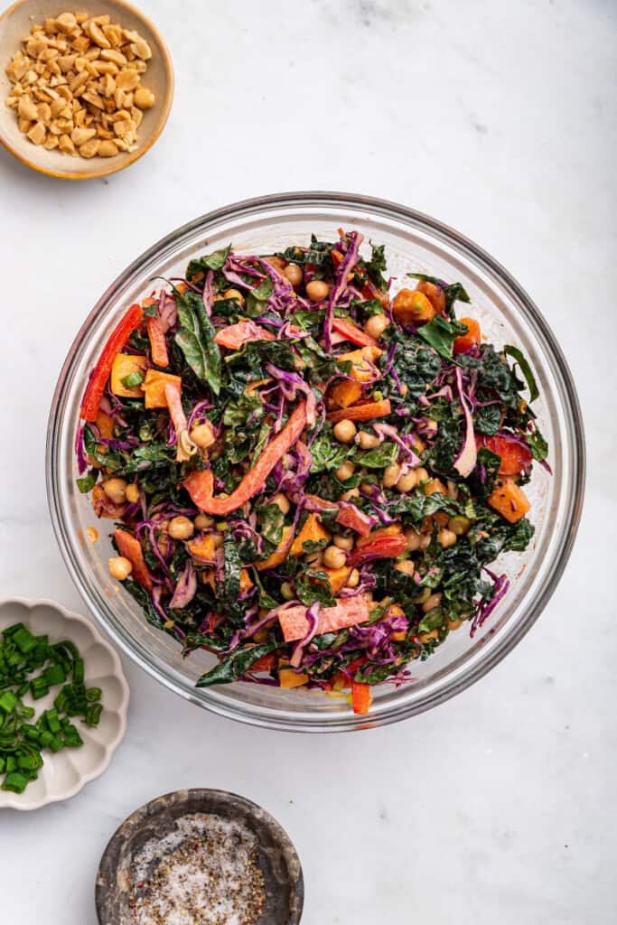 Overhead view of kale sweet potato salad in mixing bowl