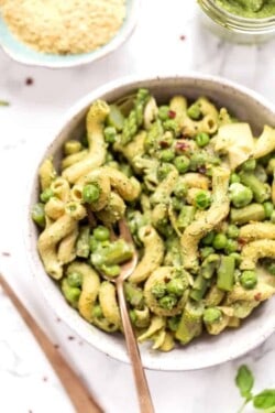 Overhead view of asparagus pasta in bowl with fork