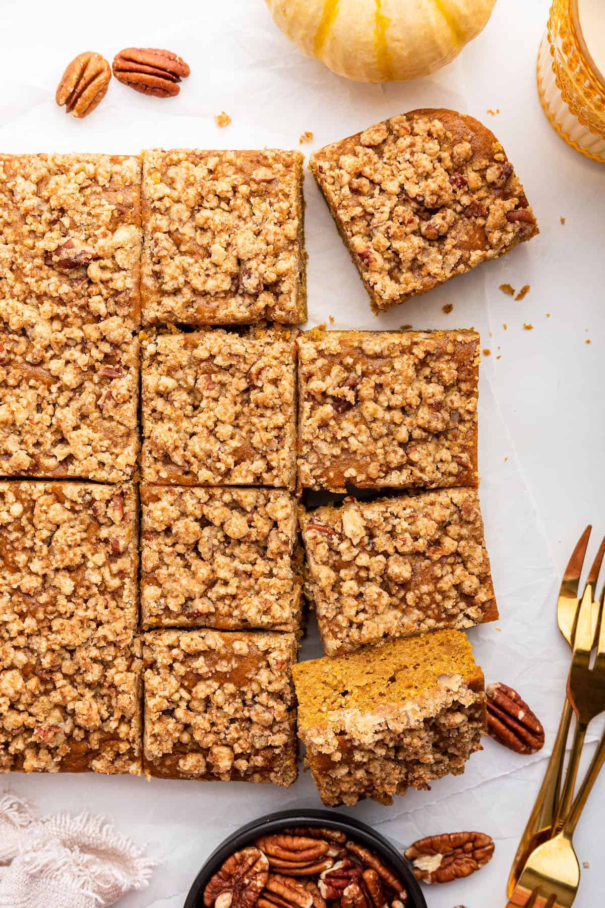 Overhead view of sliced pumpkin coffee cake