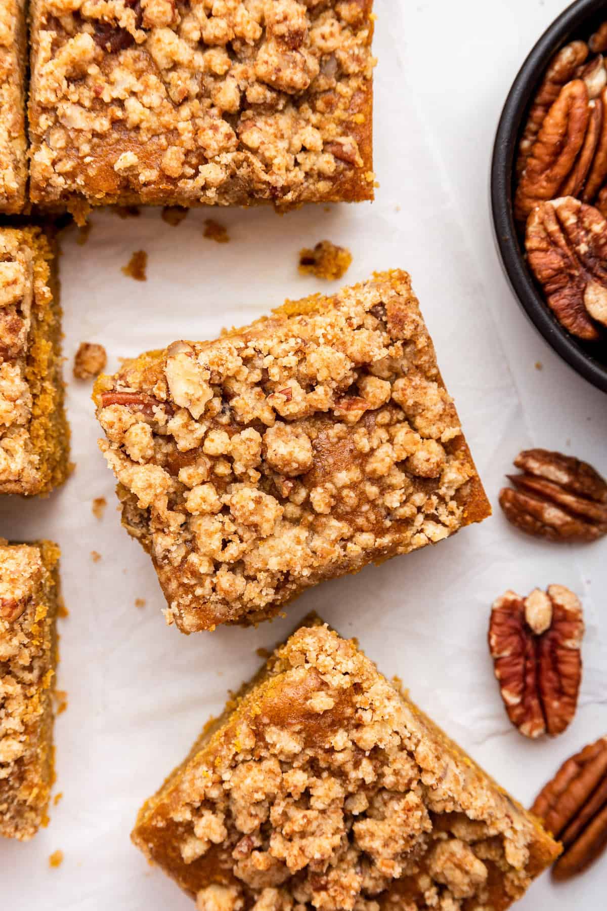 Overhead view of sliced pumpkin coffee cake