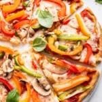 Overhead view of almond flour pizza with veggies