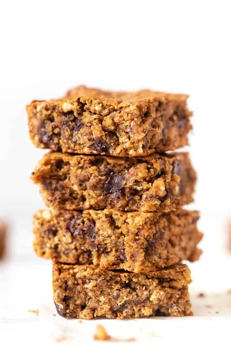 Stack of 4 peanut butter oatmeal bars with chocolate chips