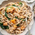 Bowl of creamy walnut pasta with butternut squash