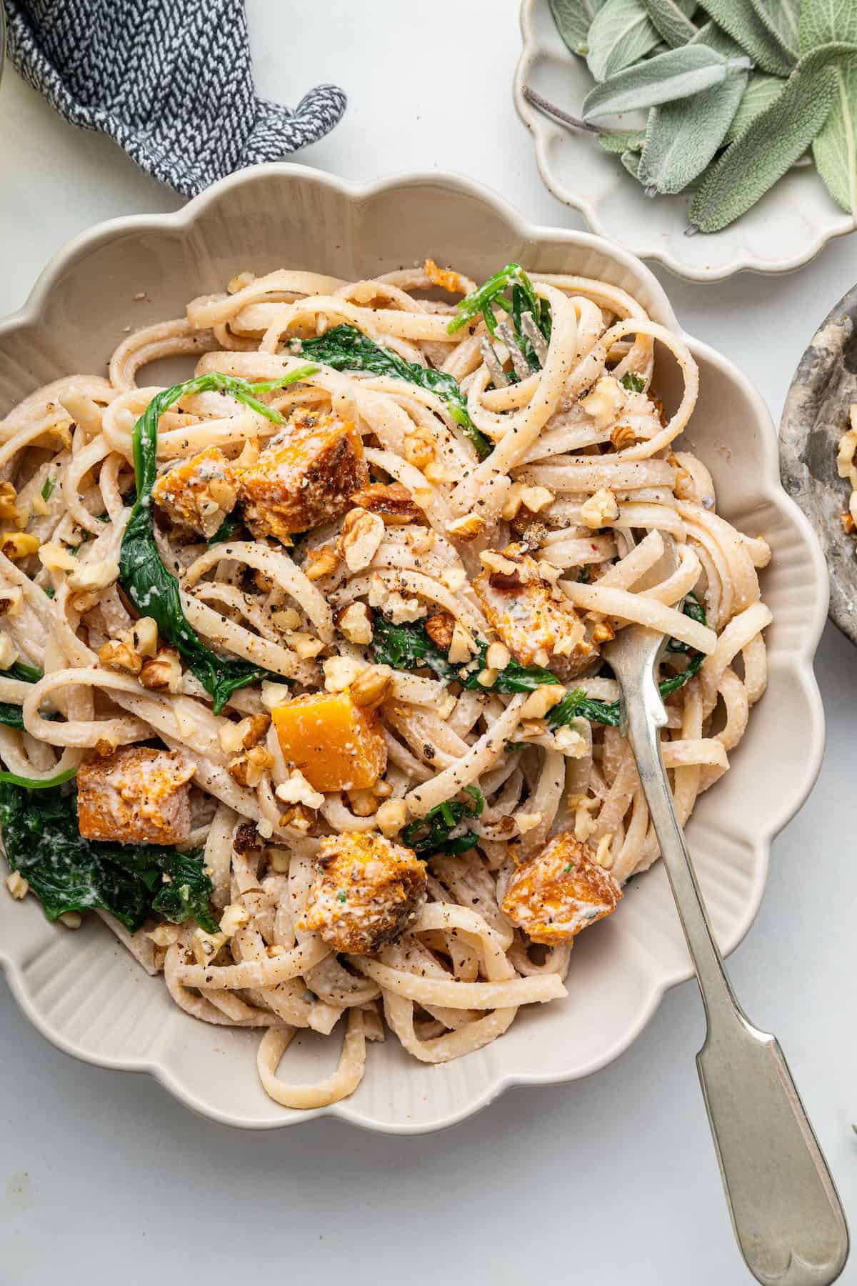 Bowl of creamy walnut pasta with butternut squash