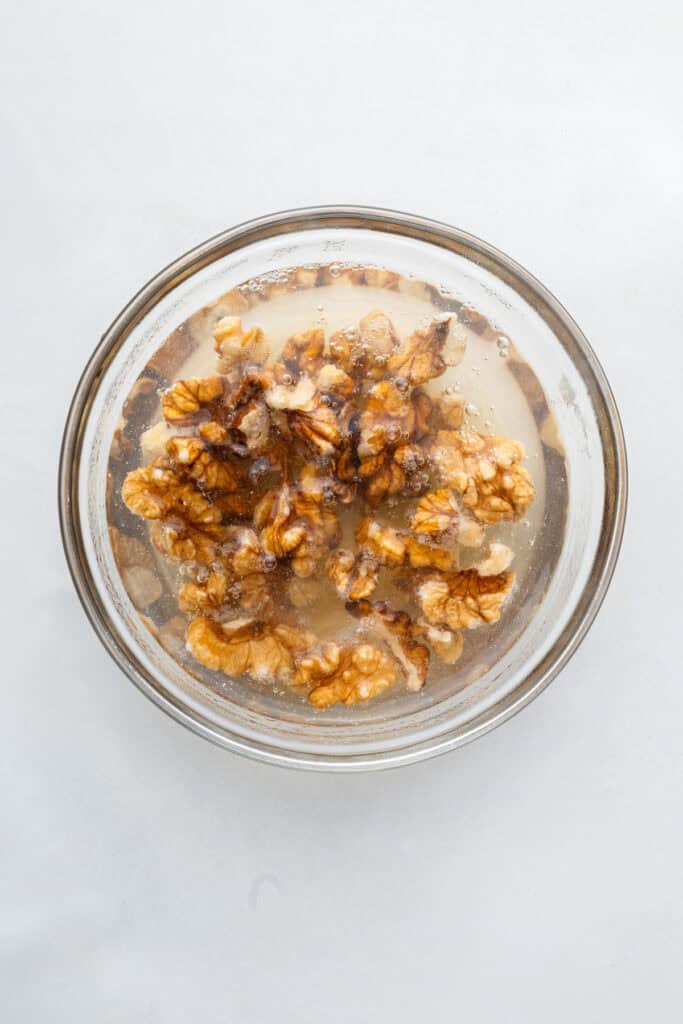 Walnuts soaking in water