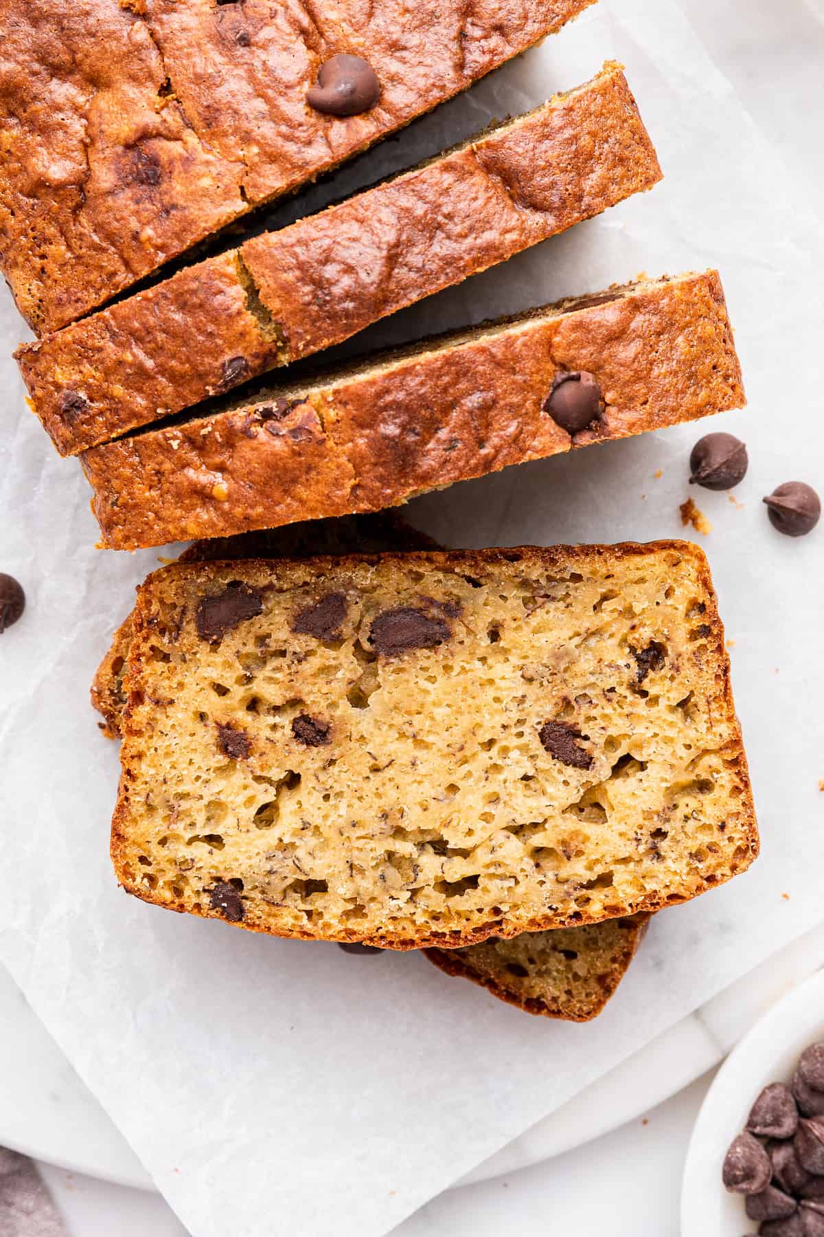 Sliced loaf of protein banana bread with chocolate chips
