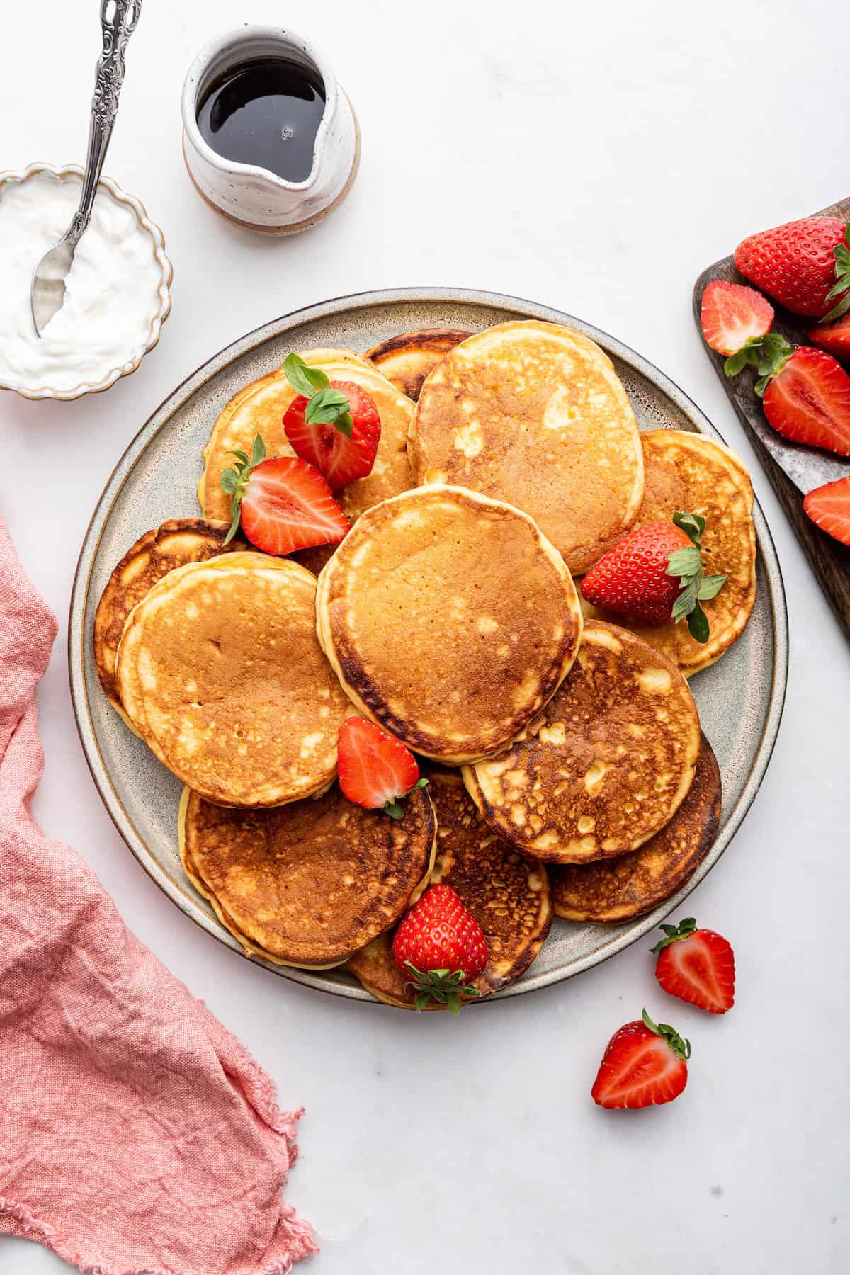 Overhead view of Greek yogurt pancakes on platter