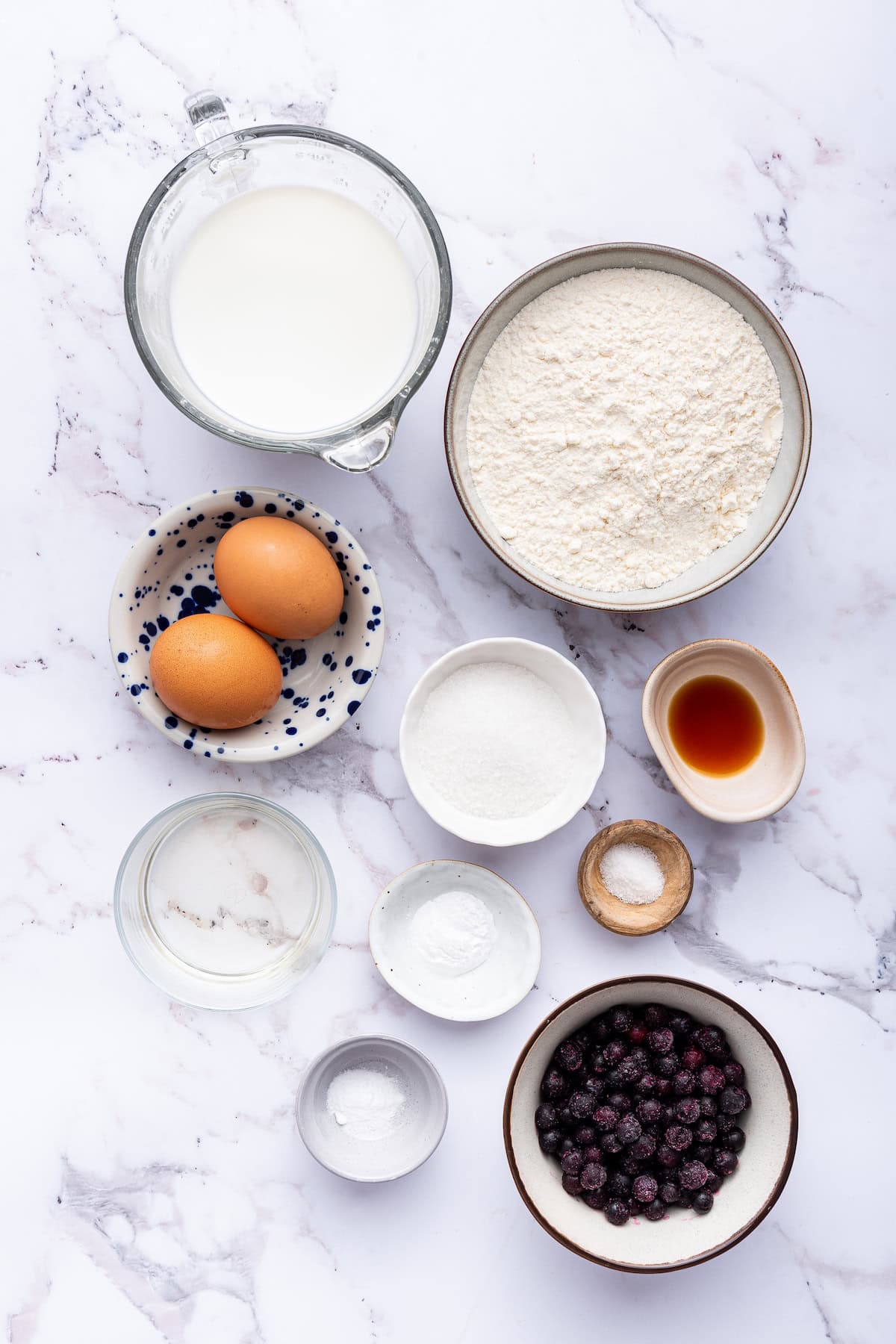 Overhead view of ingredients for blueberry waffles