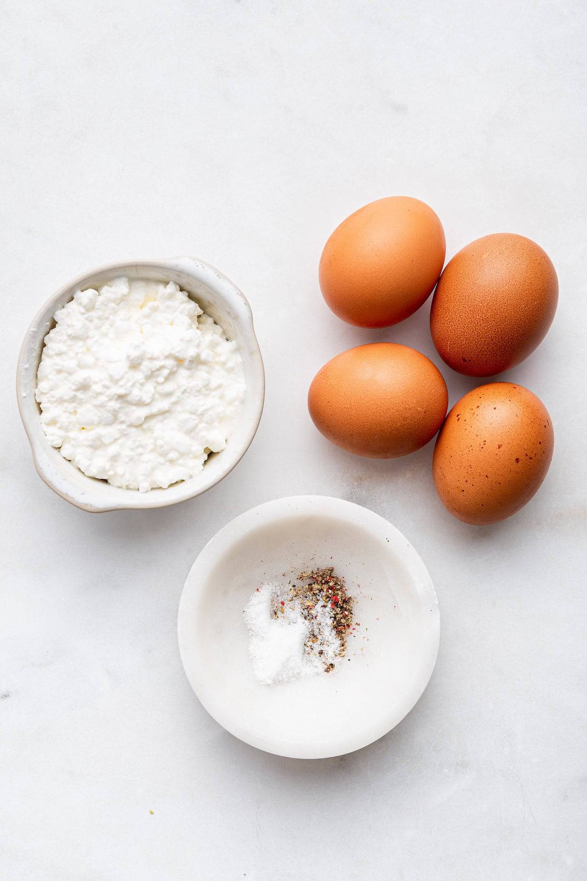 Overhead view of ingredients for cottage cheese eggs