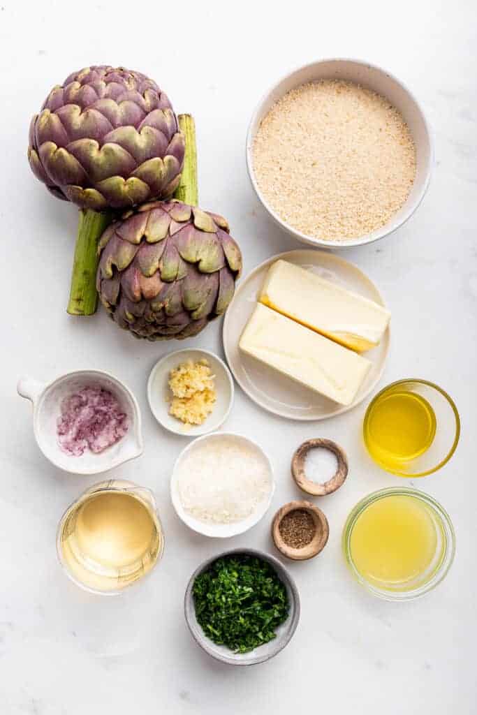 Overhead view of ingredients for stuffed artichokes