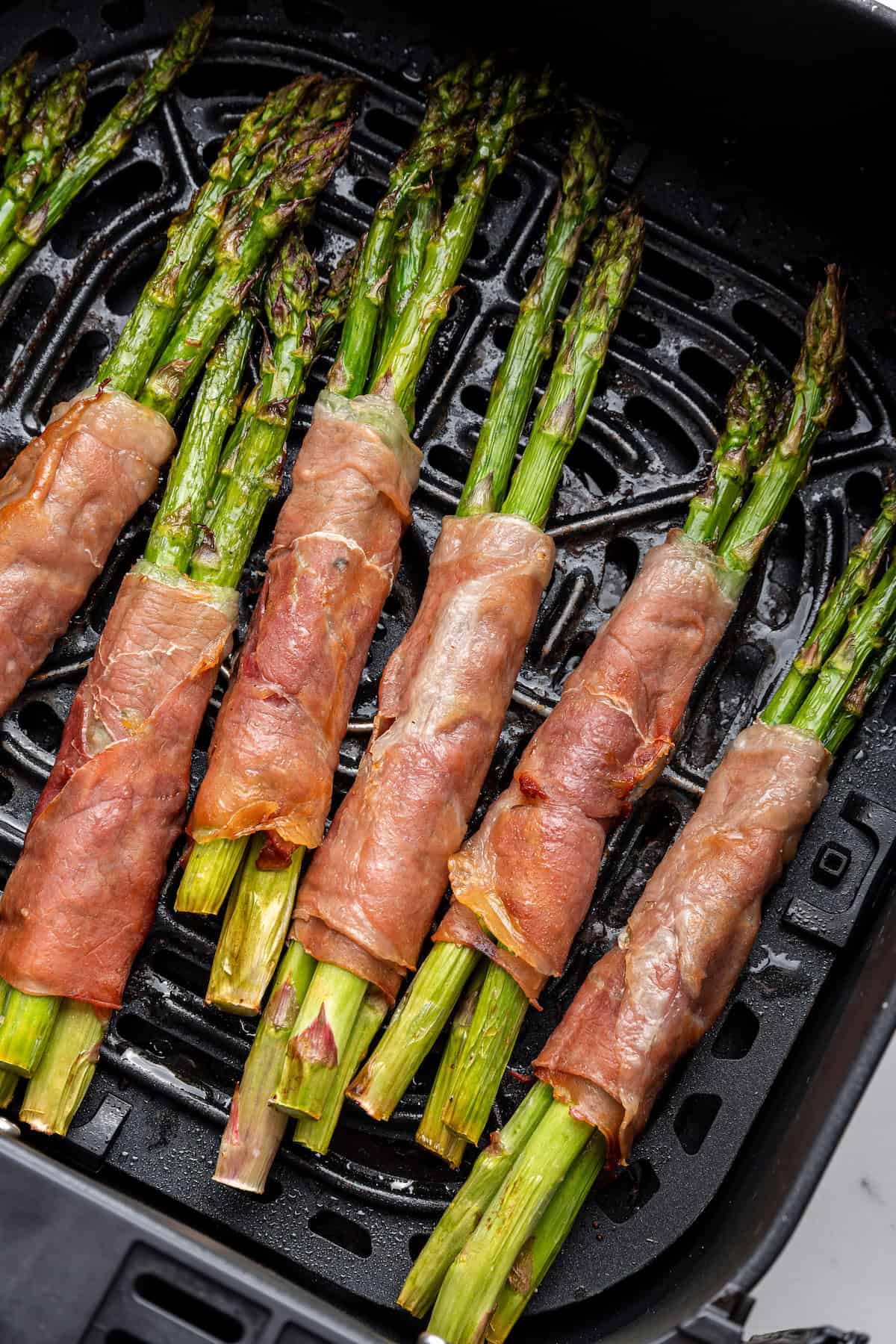 Prosciutto wrapped asparagus bundles in air fryer