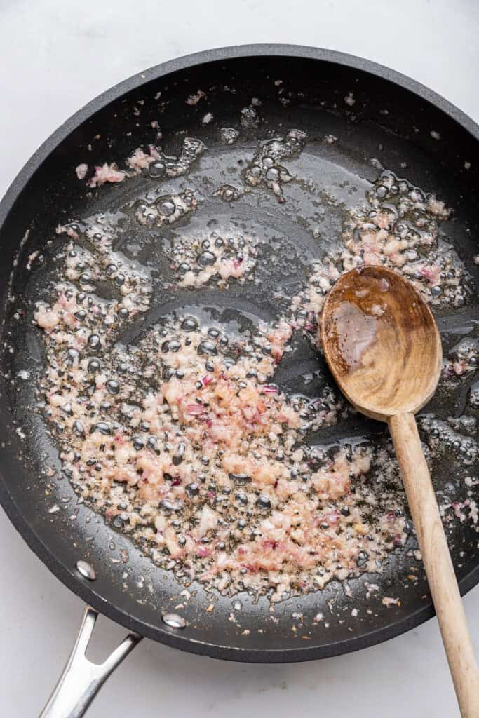 Shallots cooking in skillet