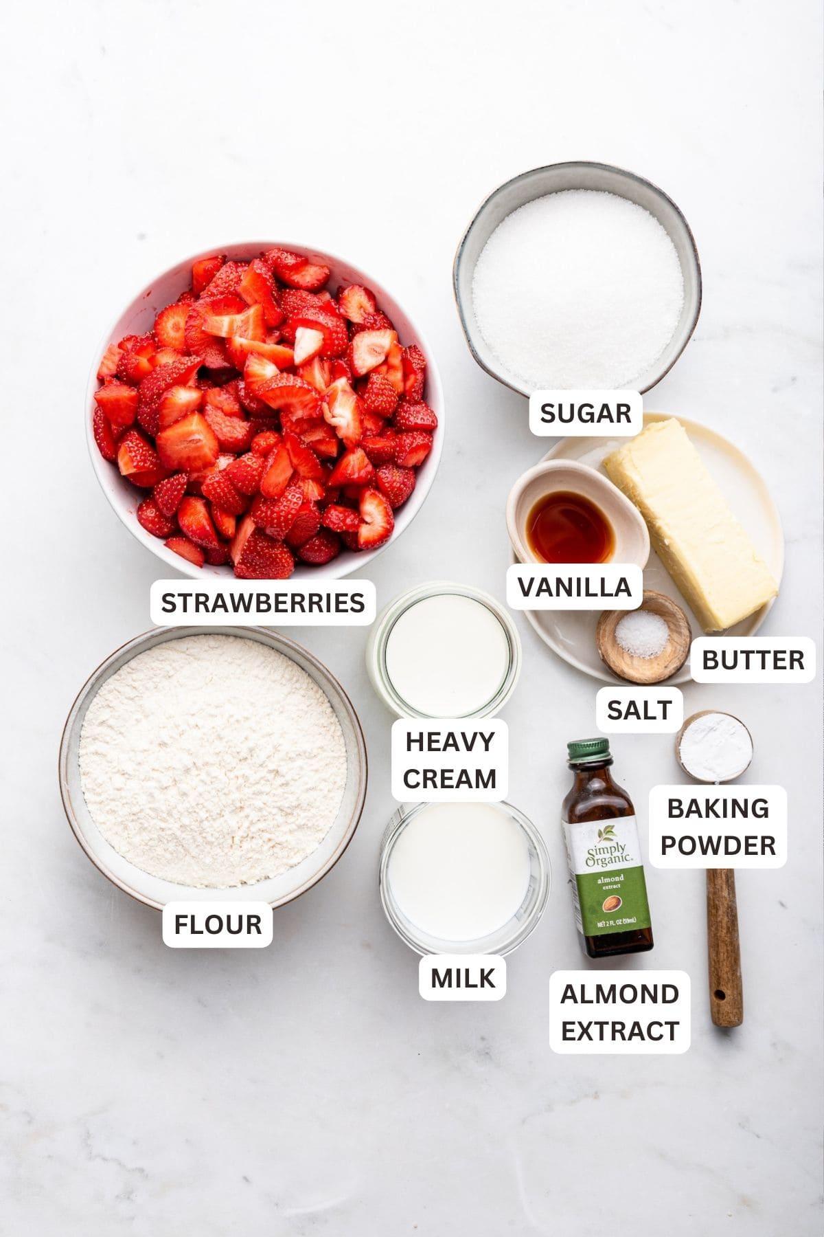 Overhead view of ingredients for strawberry cobbler