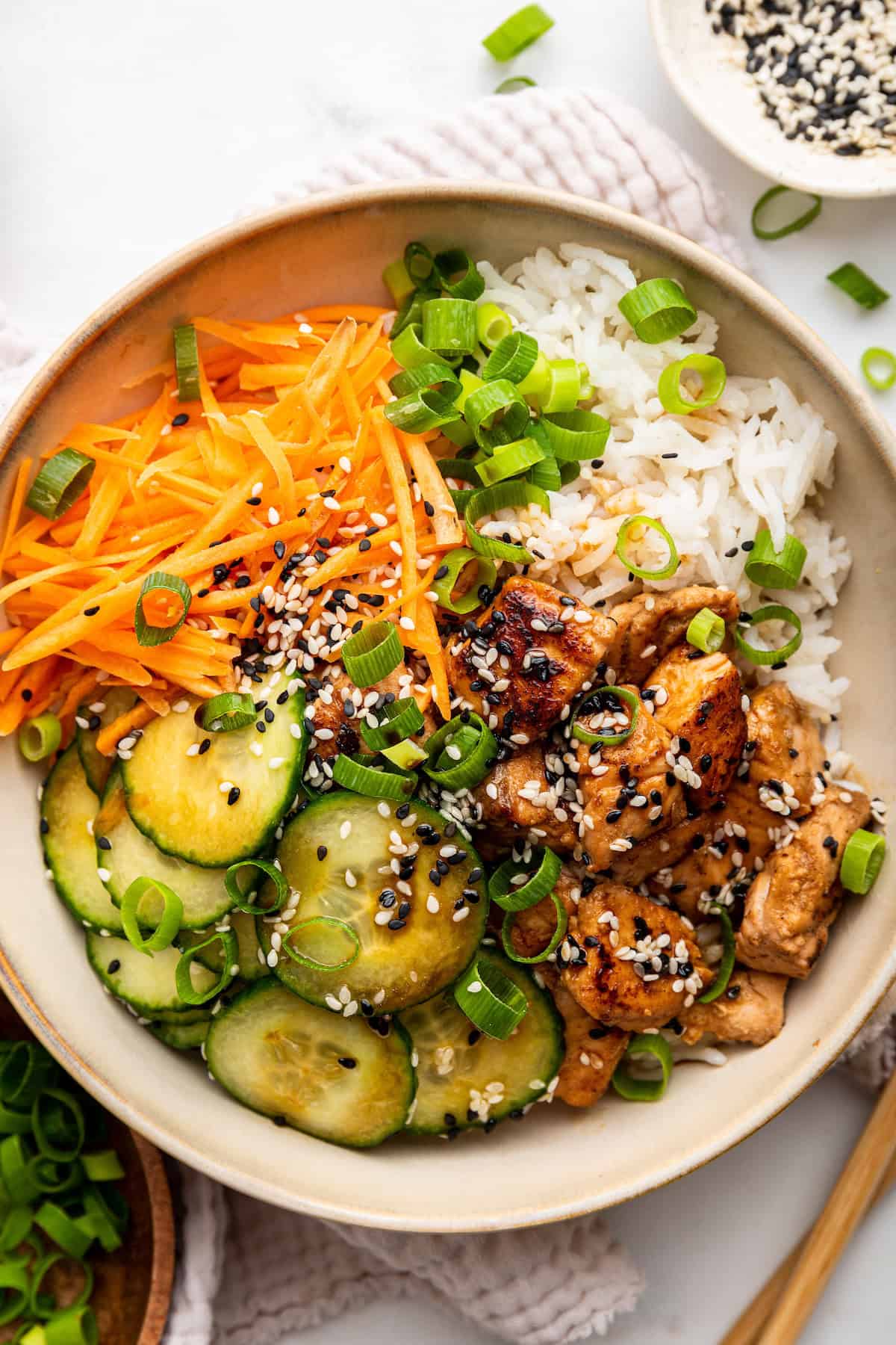 Overhead view of Asian baked salmon bowls