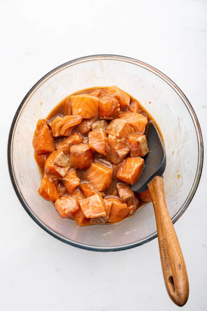 Overhead view of salmon in sauce