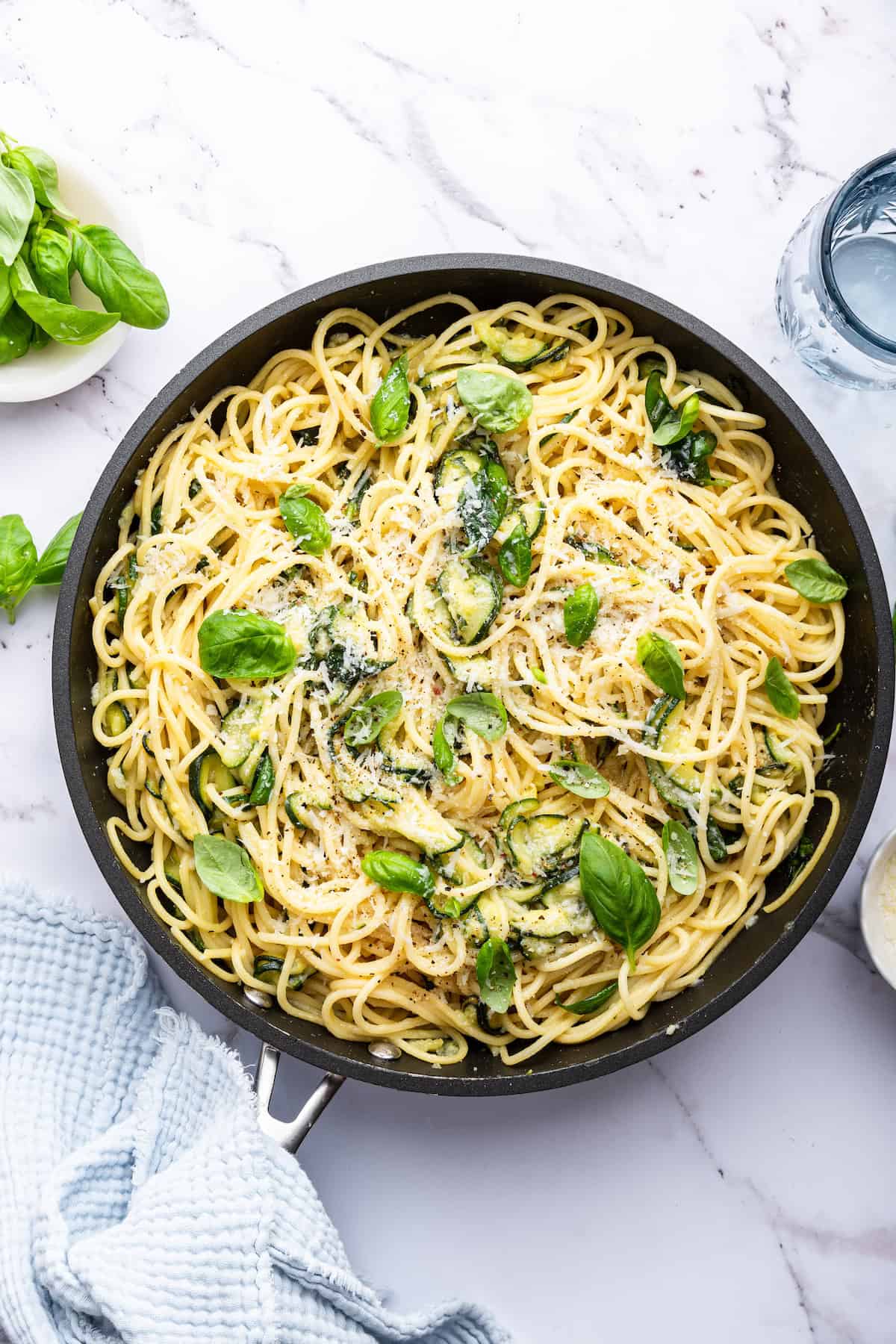 Overhead view of spaghetti alla Nerano in skillet