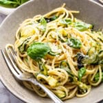 Fork in bowl of spaghetti alla Nerano