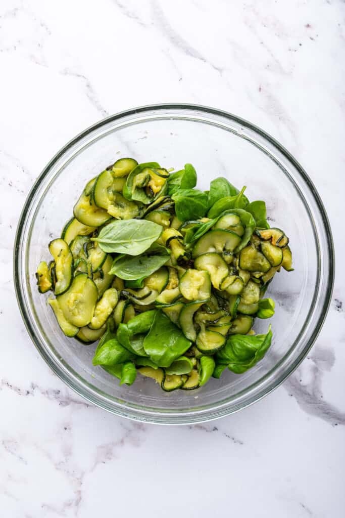 Bowl of cooked zucchini and basil