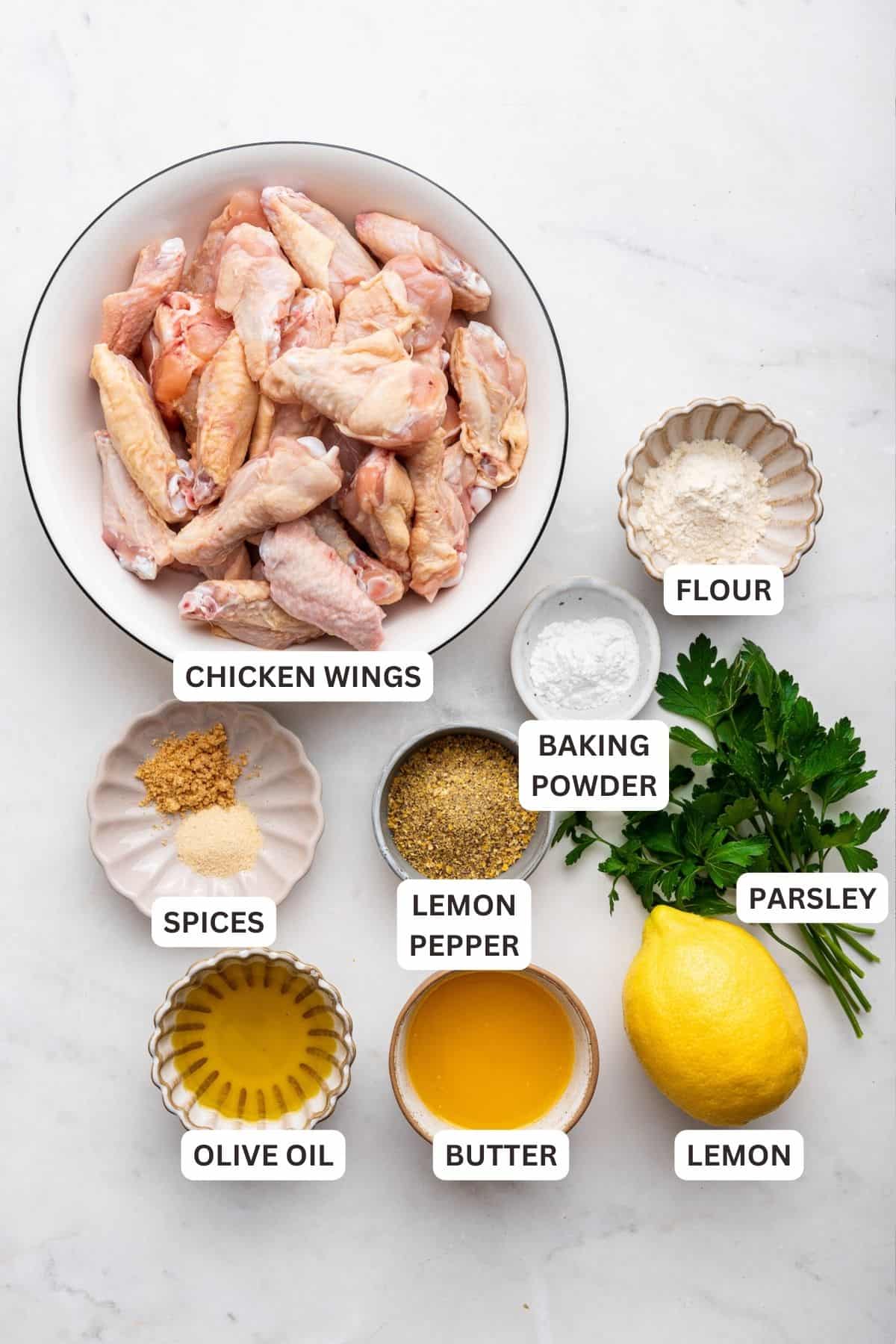 Overhead view of ingredients for lemon pepper wings with labels