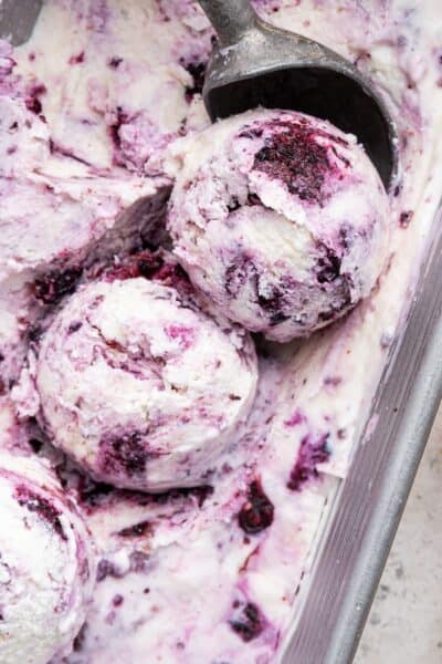 Scoops of berry cottage cheese ice cream in pan