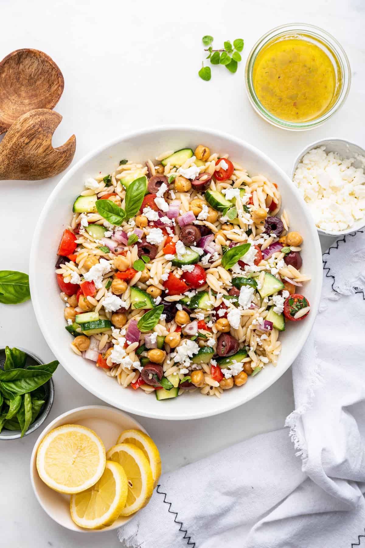 Overhead view of orzo pasta salad in large bowl