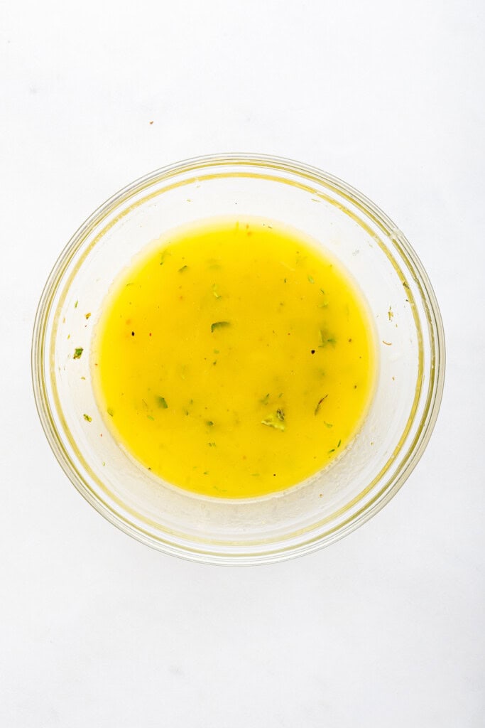 Overhead view of dressing for orzo pasta salad