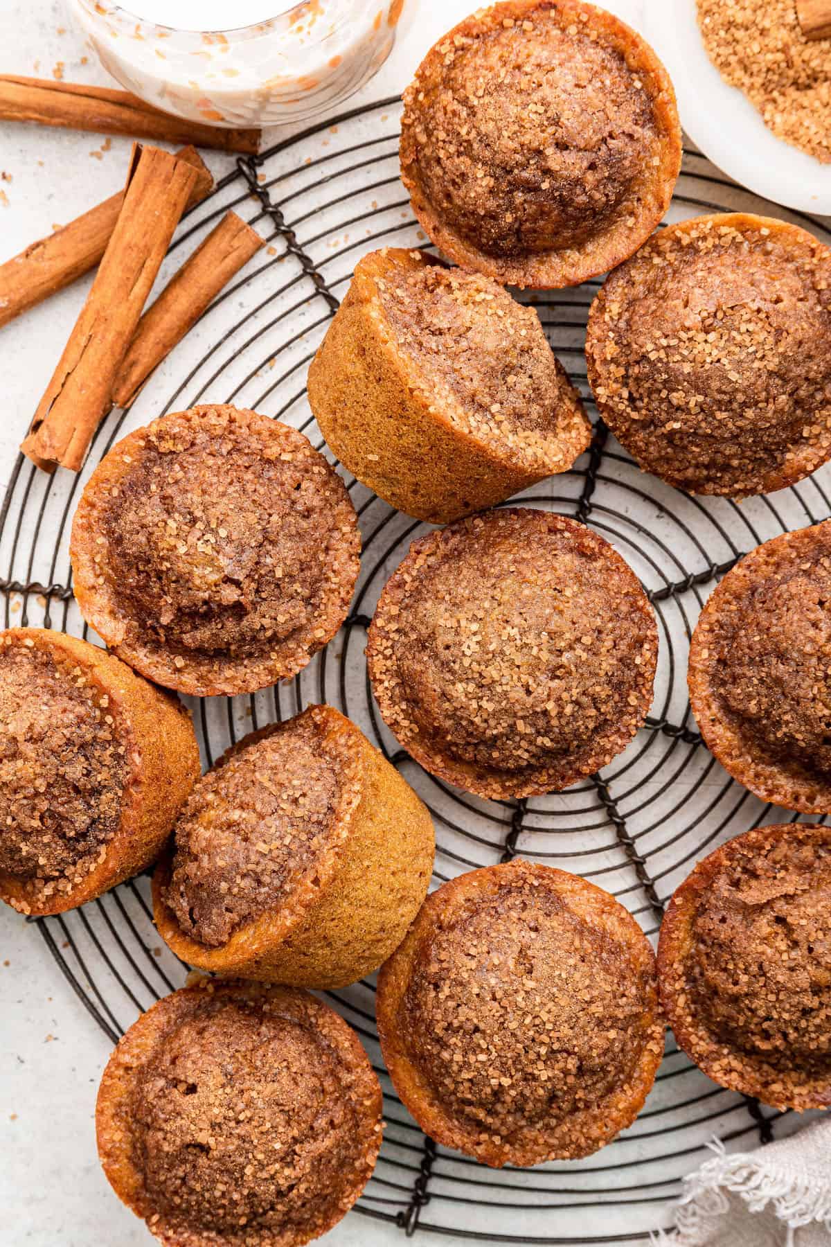 Overhead view of healthy cinnamon muffins on wire rack