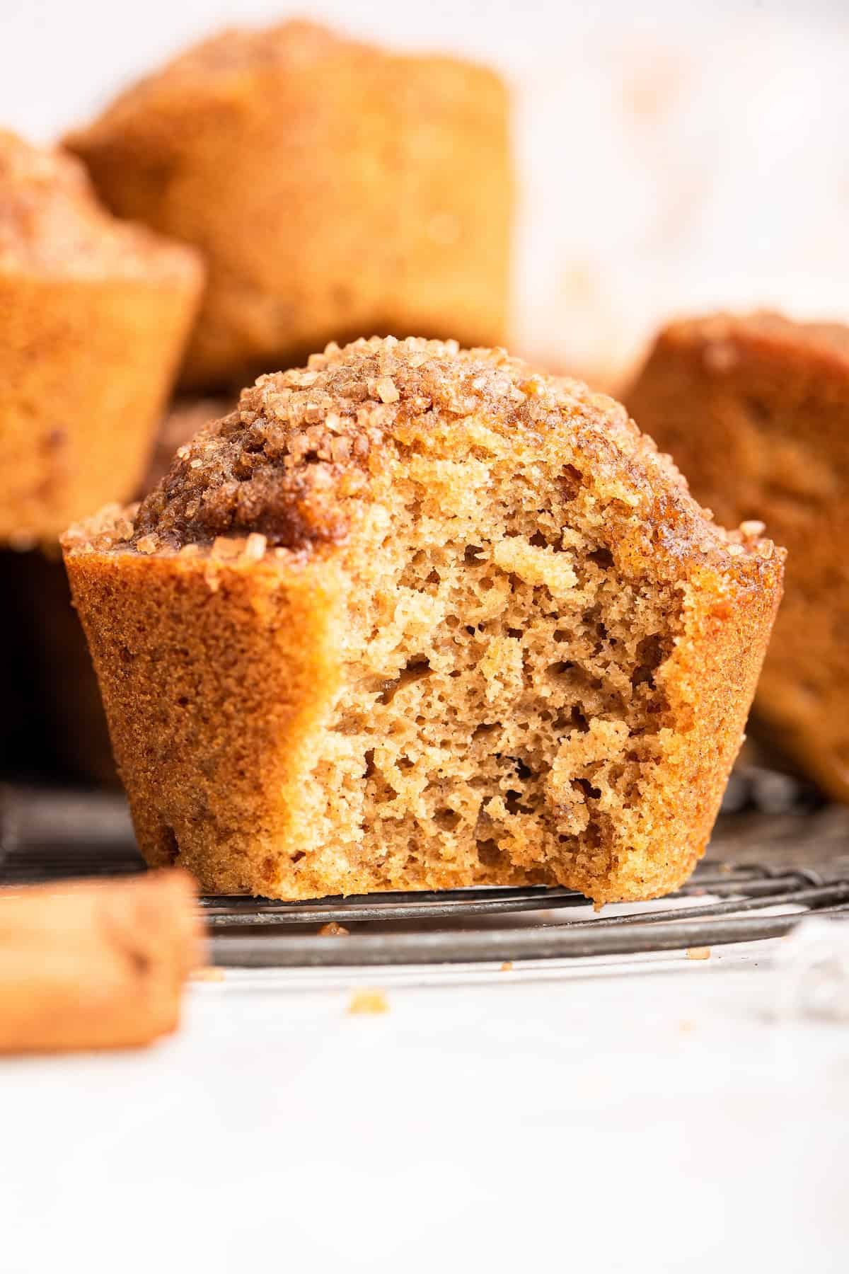 Bite taken out of healthy cinnamon muffin