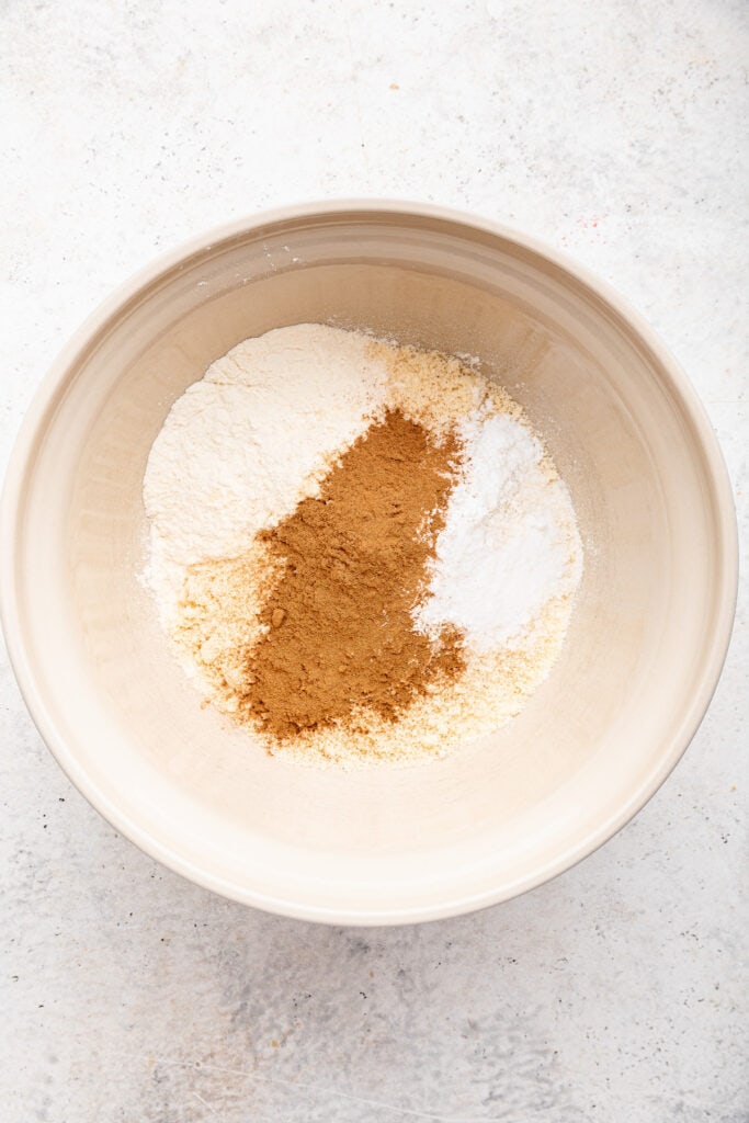 Overhead view of dry ingredients in mixing bowl before whisking