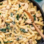 Overhead view of garlic Parmesan chicken pasta in skillet