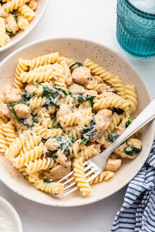 Overhead view of garlic Parmesan chicken pasta in bowl