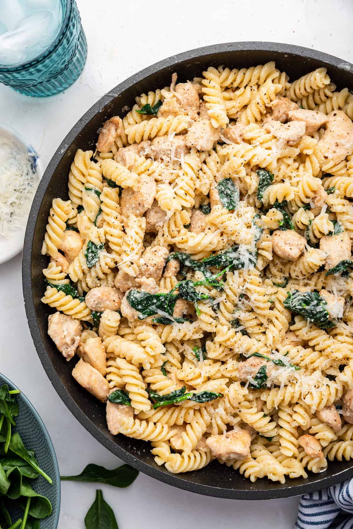 Overhead view of garlic Parmesan chicken pasta in skillet