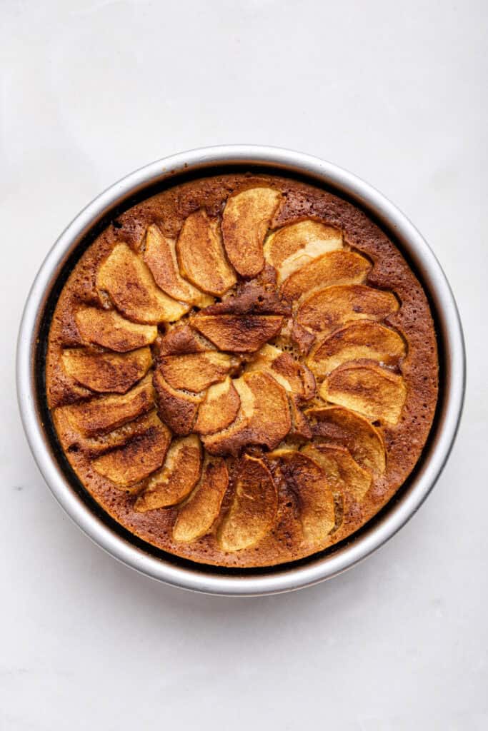 Overhead view of German apple cake in pan