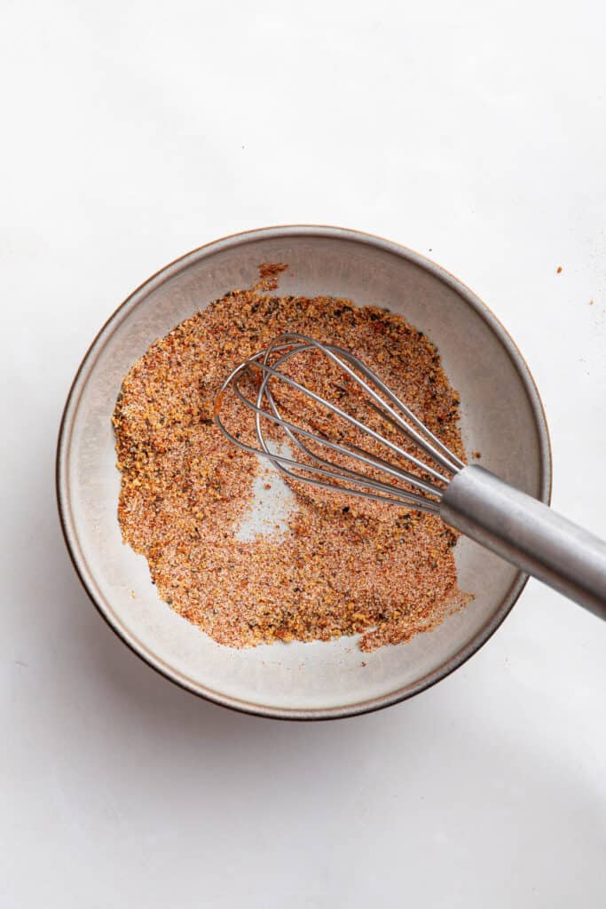 Seasoning for smothered chicken in bowl