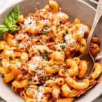 Beefaroni in bowl with spoon