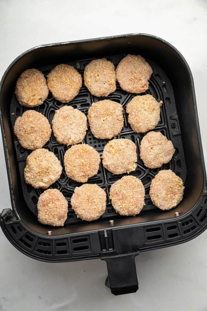 Chicken nuggets in the air fryer before cooking