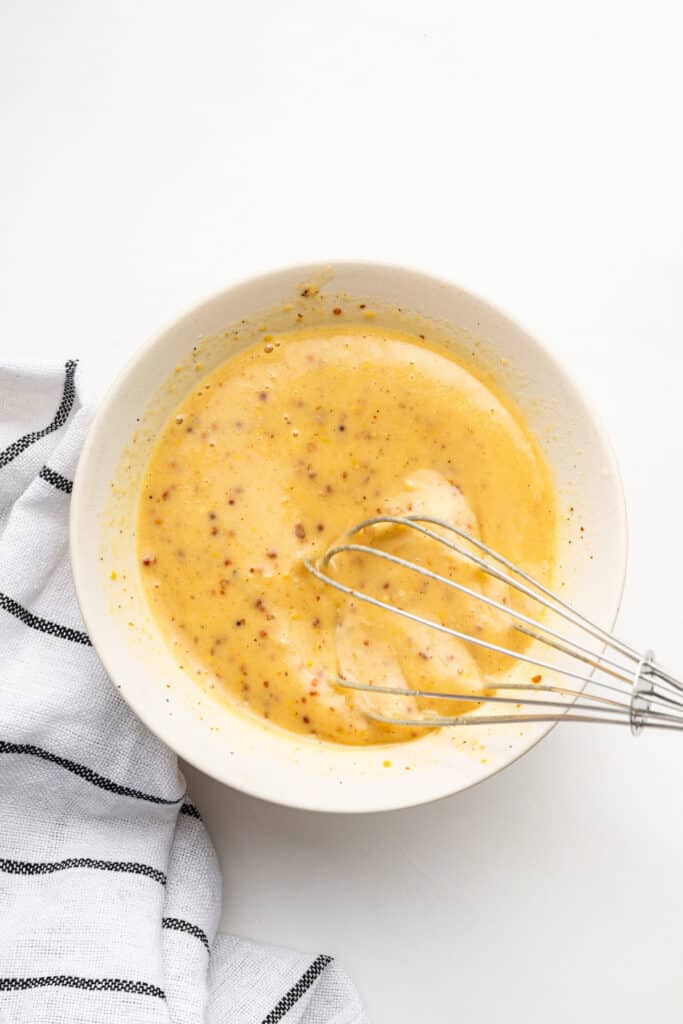 Whisking honey mustard dipping sauce