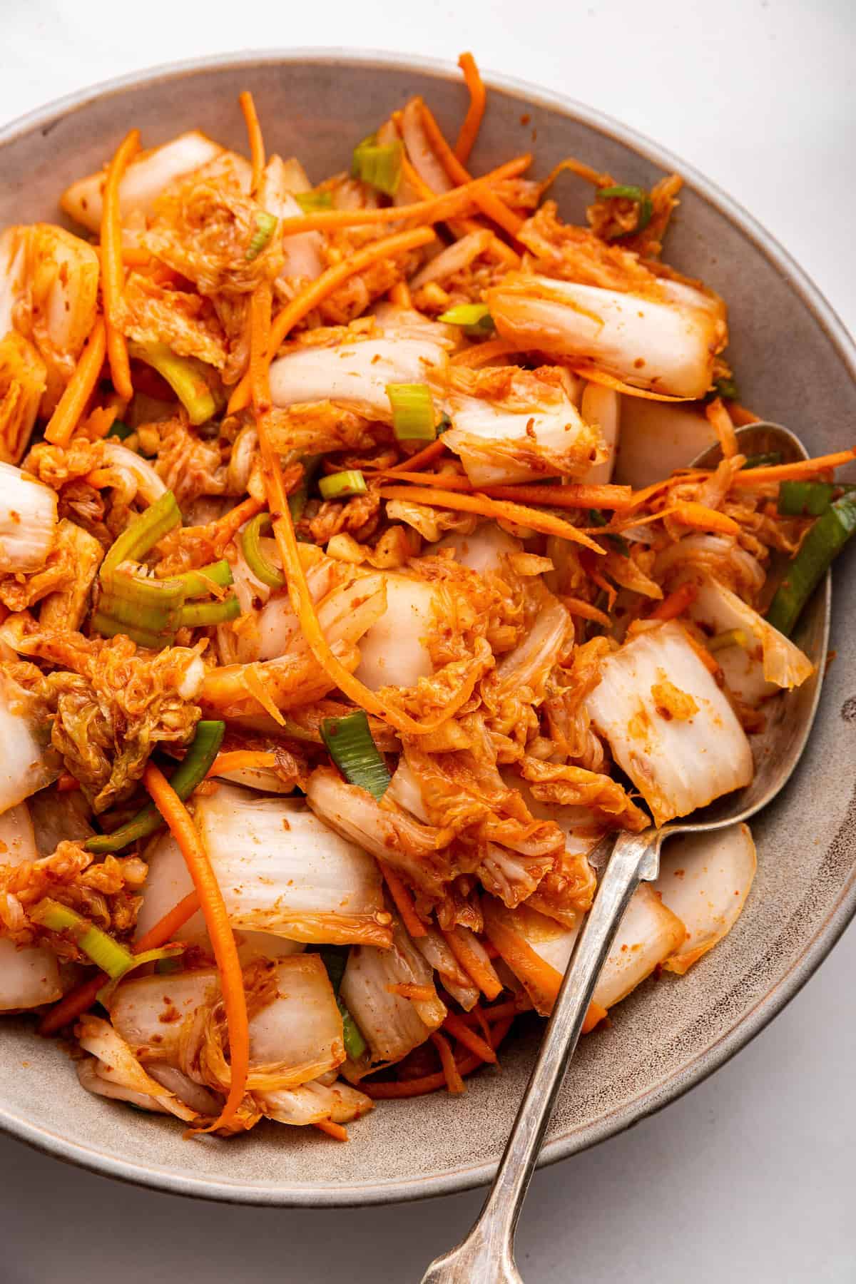 Bowl of kimchi with spoon