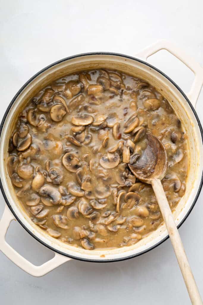 Mushrooms and thickened broth for mushroom pasta