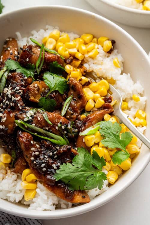 Chicken bulgogi in bowl with rice and corn