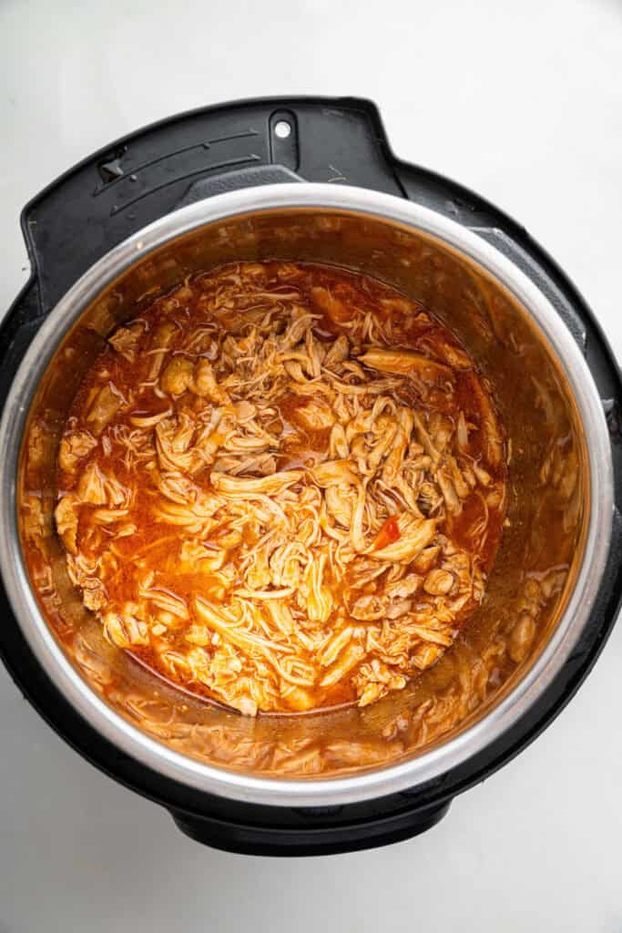 Overhead view of salsa chicken cooked in instant pot