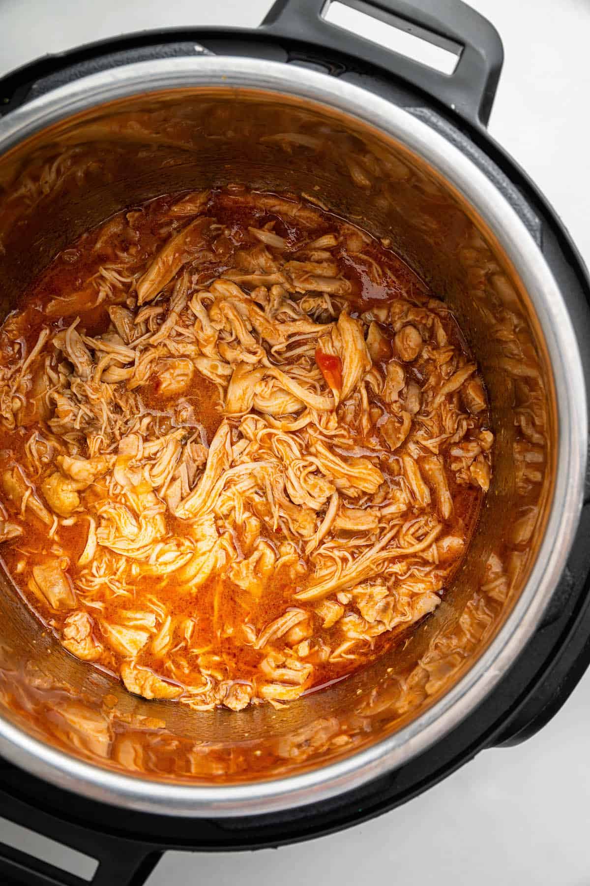 Overhead view of salsa chicken in instant pot