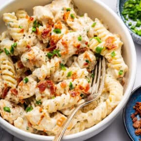 Chicken bacon ranch pasta in bowl with fork