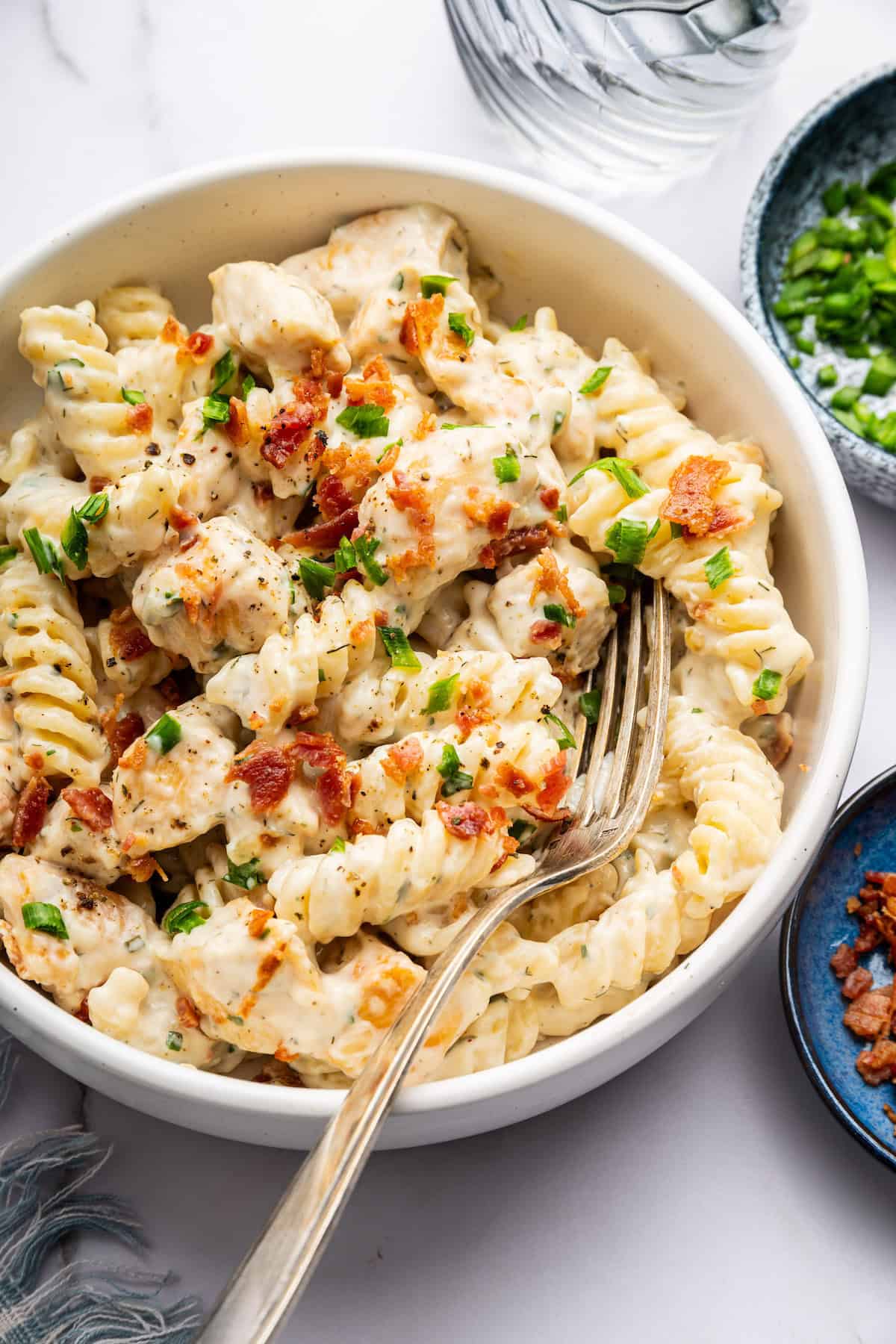 Chicken bacon ranch pasta in bowl with fork